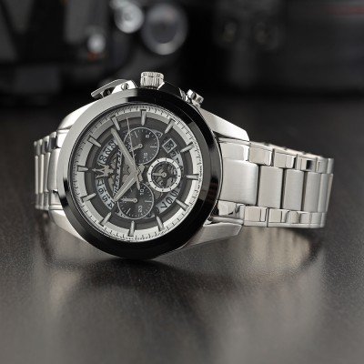 Maserati Traguardo chronograph watch three-quarter view showing black bezel and silver bracelet