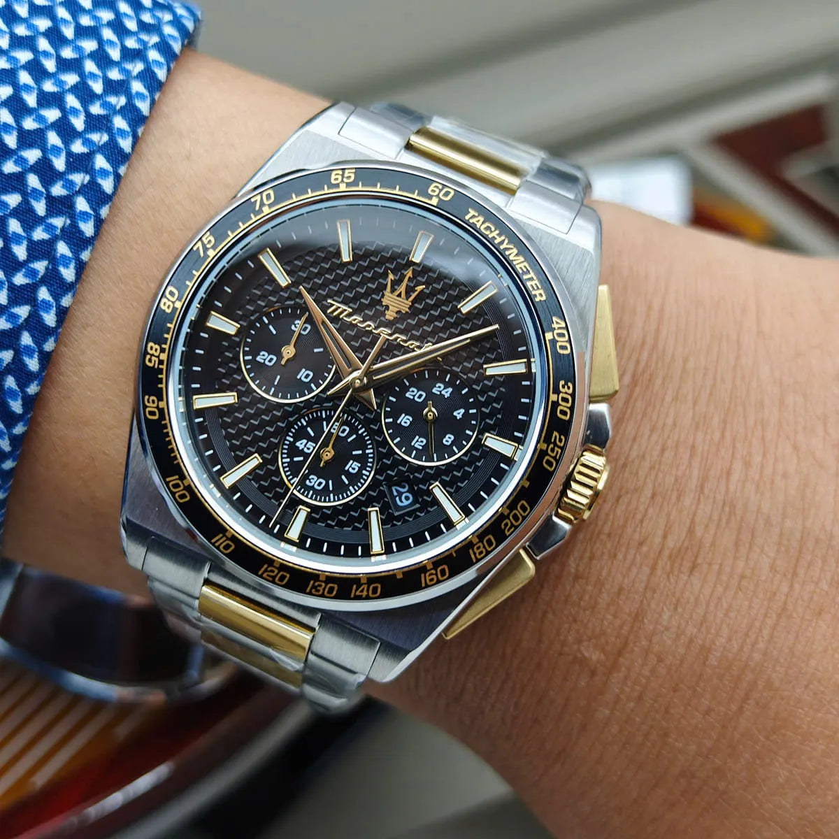 Maserati Velocità R8873652003 chronograph watch worn on wrist, two-tone design with black dial