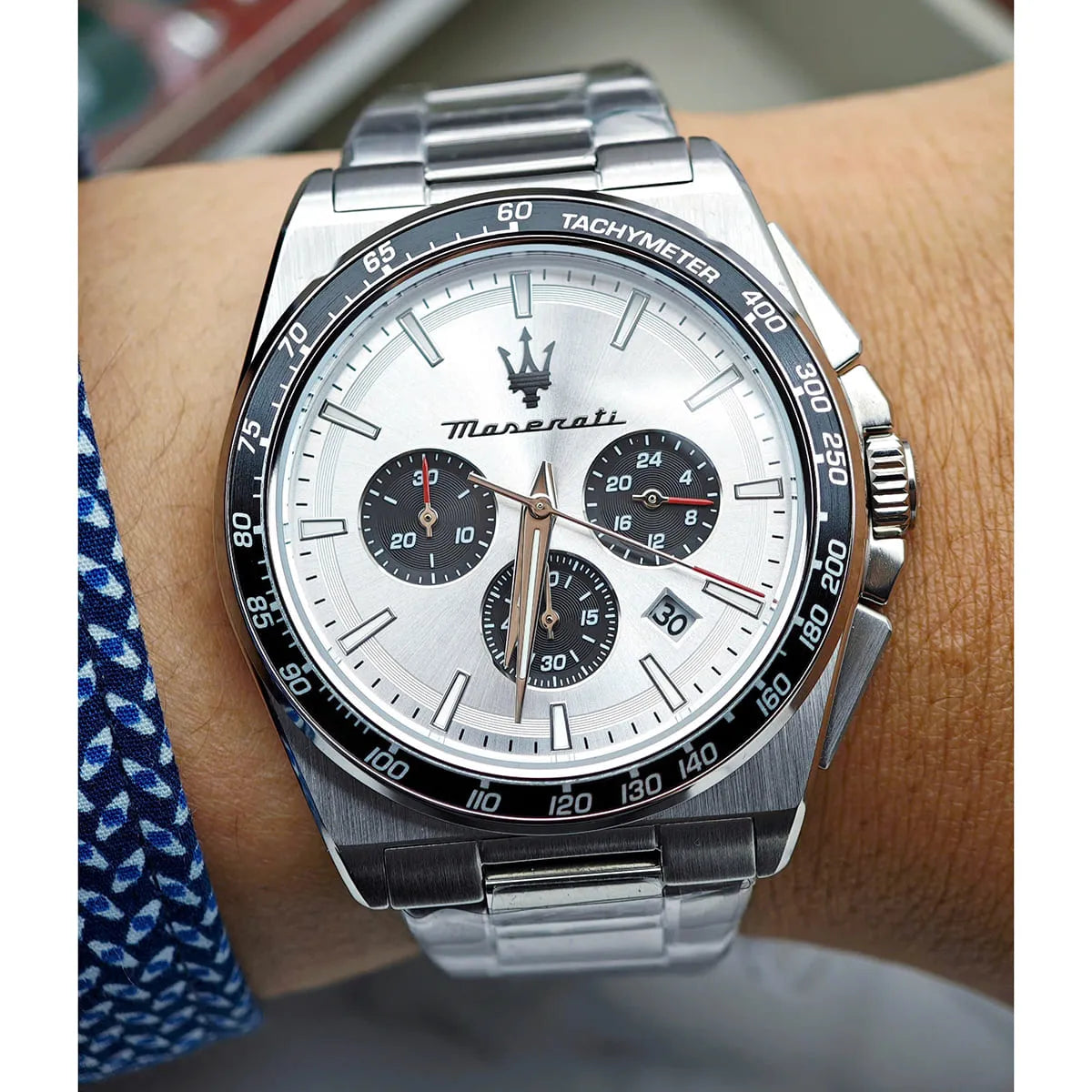 Maserati Velocità chronograph watch worn on wrist showing silver dial and black subdials
