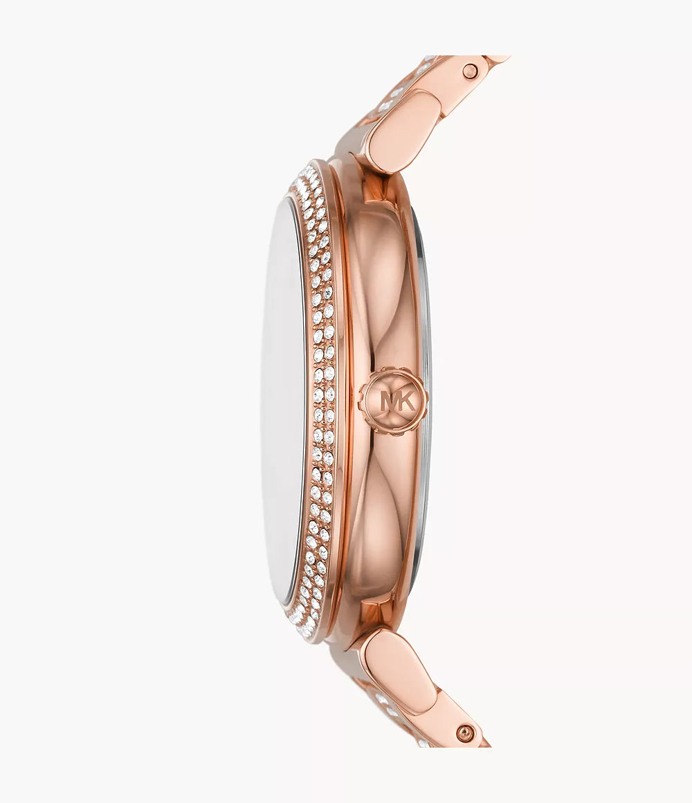 Side view of Michael Kors Abbey rose gold-tone watch showing crystal-set bracelet