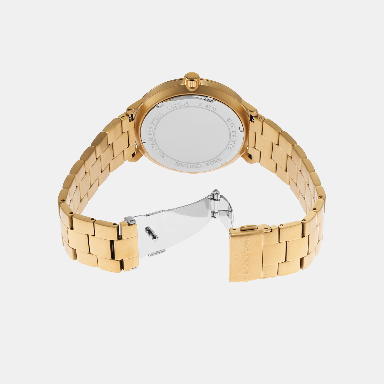 Michael Kors Blake watch caseback and gold-tone bracelet detail