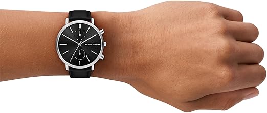 Michael Kors Blake chronograph watch worn on wrist with black dial and leather strap