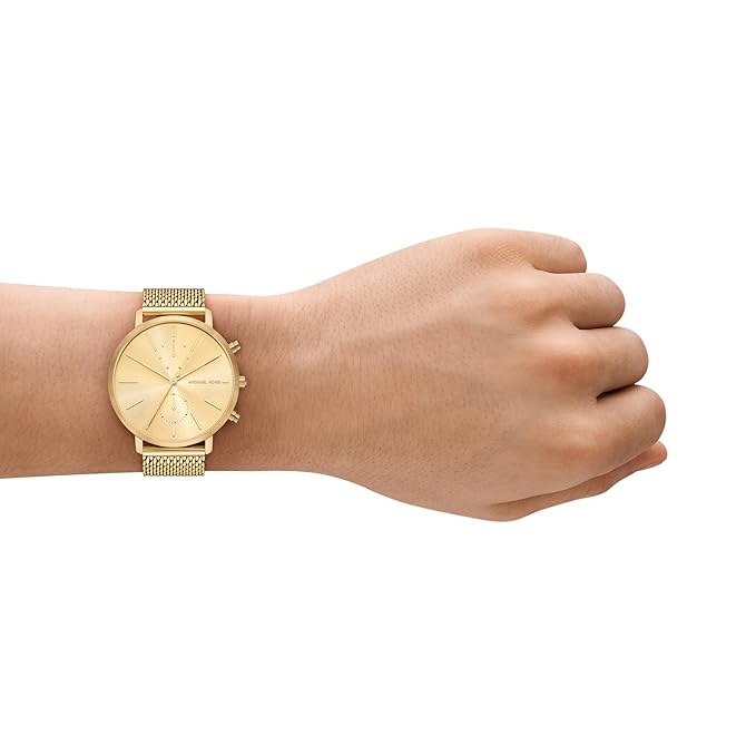 Michael Kors Blake MK9210 gold watch worn on wrist with mesh strap