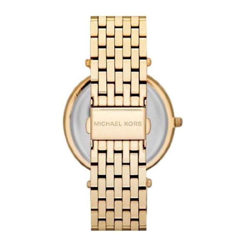 Case back view of Michael Kors Darci gold watch with bracelet