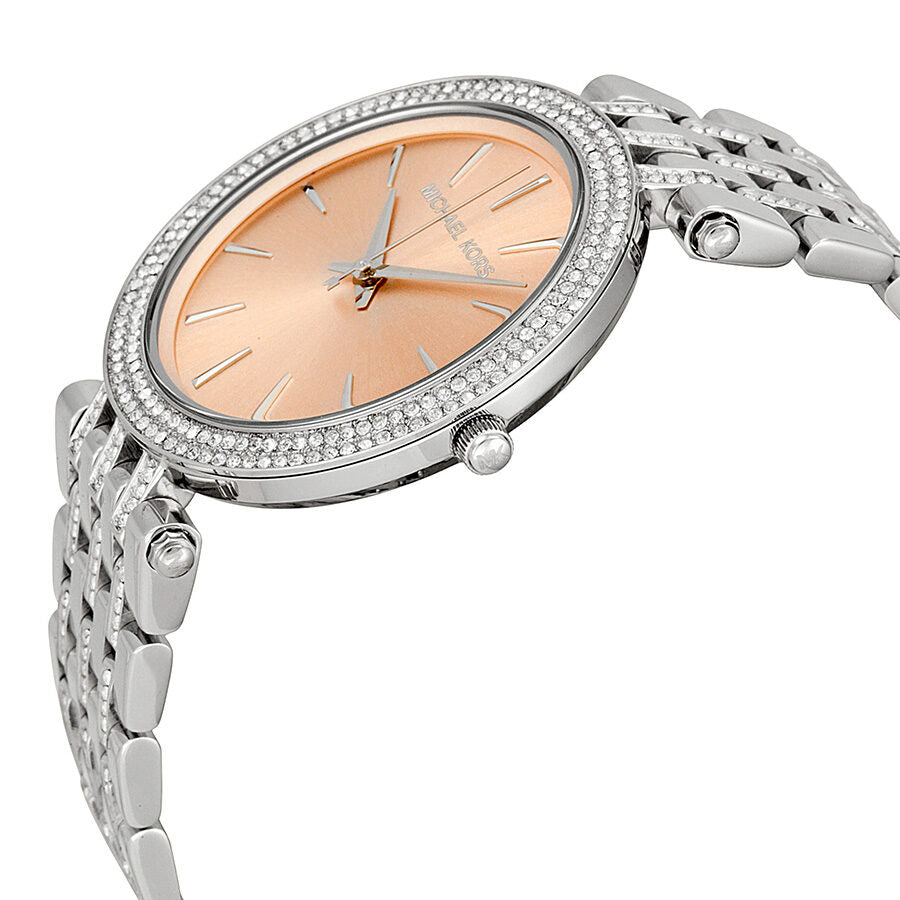 Michael Kors Darci side view showing rose gold dial and crystal-adorned silver-tone bracelet