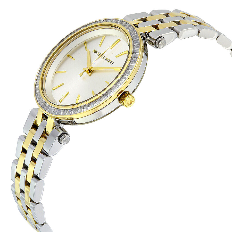 Michael Kors Darci two-tone bracelet watch shown at angle with pearl white dial and crystal bezel