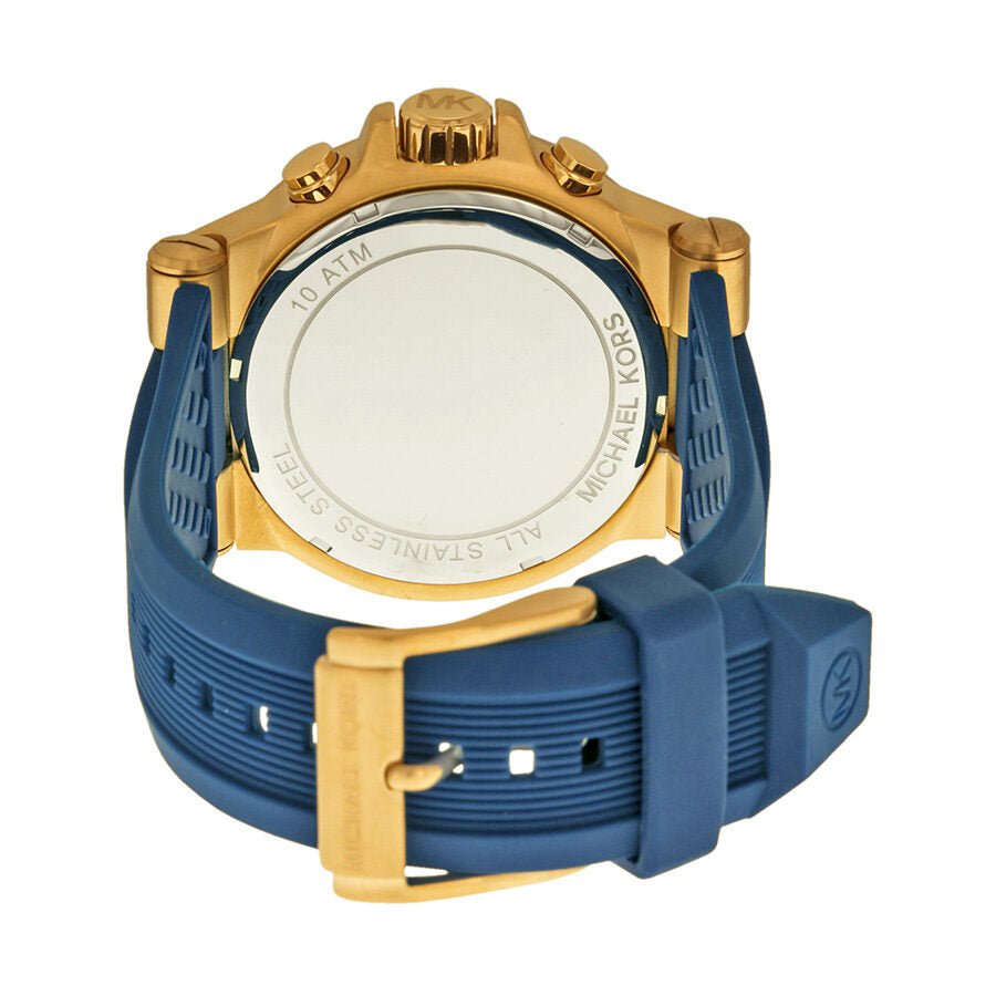 Michael Kors Dylan chronograph watch caseback showing engraved text and navy strap
