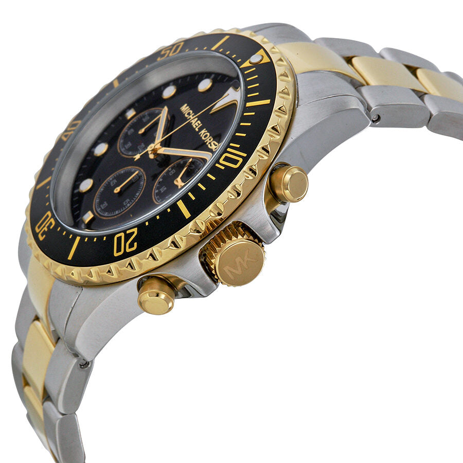 Michael Kors Everest chronograph watch angled view showing gold-tone bezel, pushers, and two-tone bracelet