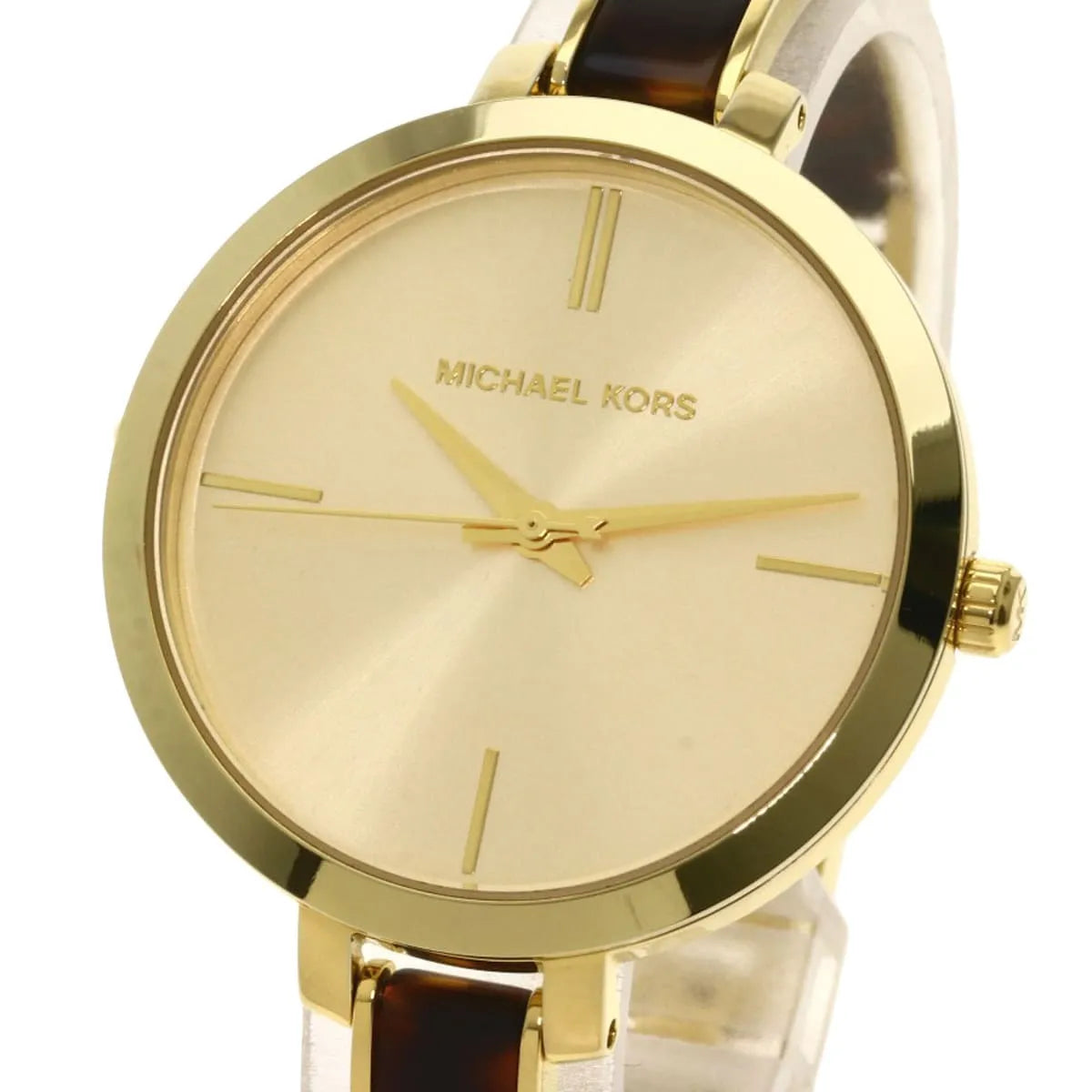 Close-up detail of Jaryn gold dial with hour markers and Michael Kors logo