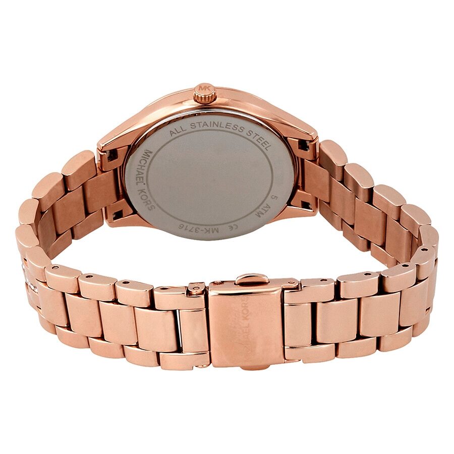 Michael Kors Lauryn watch caseback showing stainless steel case and crown