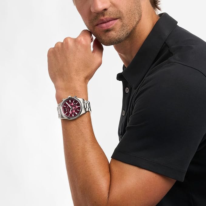 Man wearing Michael Kors Lexington stainless steel chronograph watch with burgundy dial