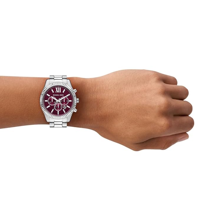 Michael Kors Lexington chronograph watch worn on wrist with burgundy dial visible