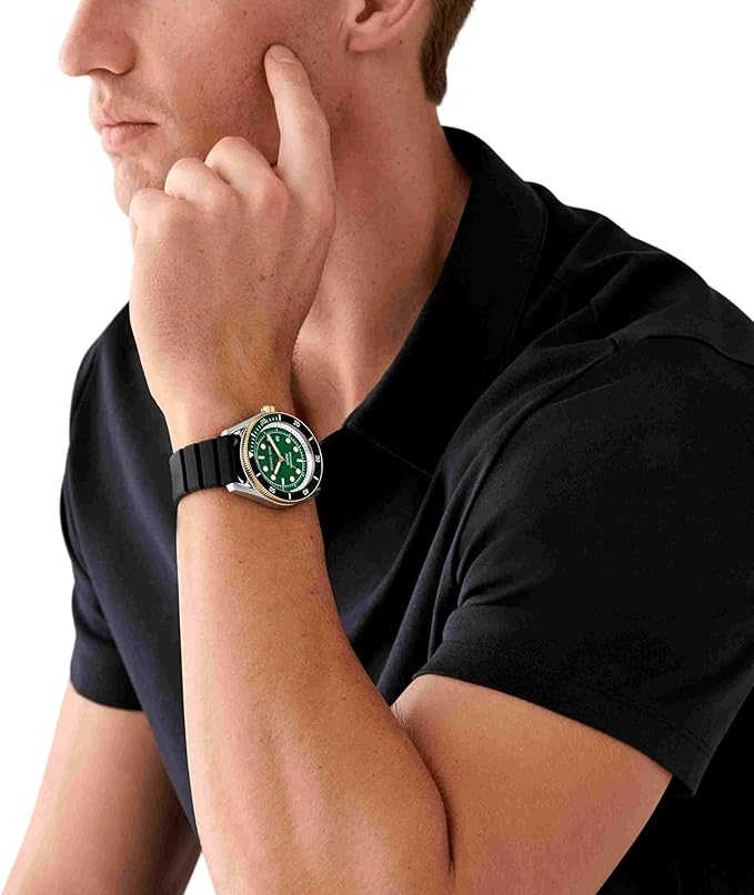 Michael Kors Maritime watch worn on wrist with green dial visible