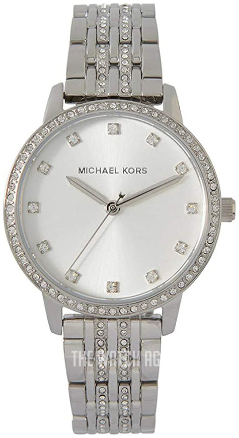 Michael Kors Melissa silver watch face with crystal hour markers and diamond-set bezel