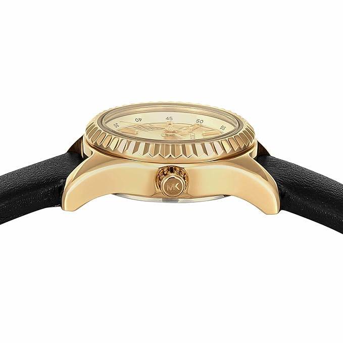 Side view of Michael Kors Micro Lexington watch showing gold case profile and black leather strap
