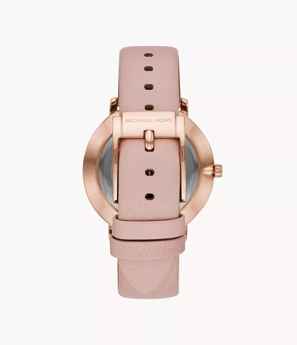 Michael Kors MK2741 watch caseback showing rose gold case and pink leather strap
