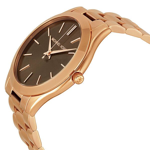 Michael Kors rose gold watch at angle showing dial and rose gold bracelet