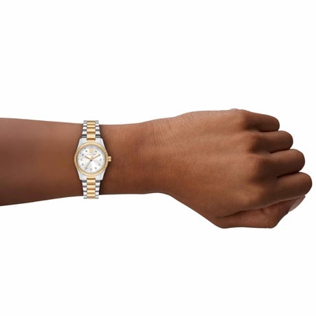 Michael Kors MK4953 Mini Lexington watch worn on wrist showing two-tone stainless steel design