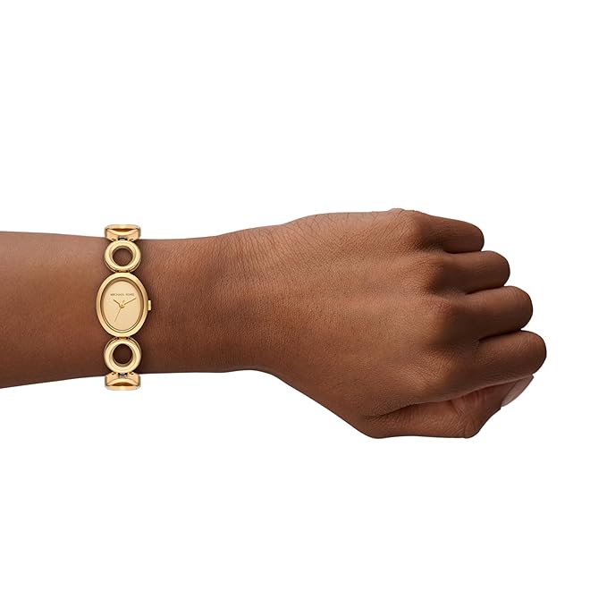 Michael Kors MK4957 gold-tone watch worn on wrist showing fit and proportions