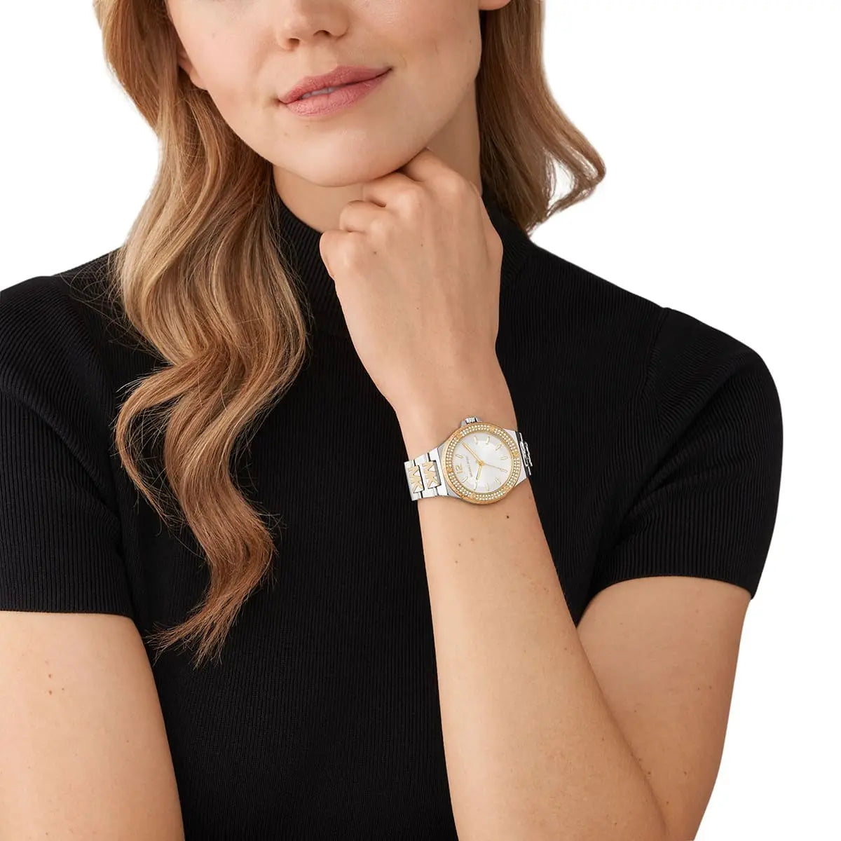 MK7338 two-tone ladies watch worn on wrist with white dial and crystal bezel