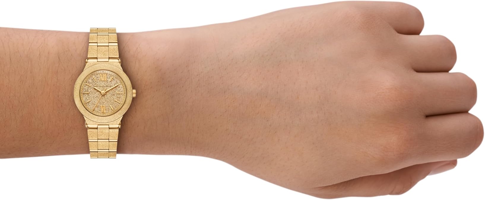 Michael Kors MK7554 gold-tone watch worn on wrist showing fit and styling