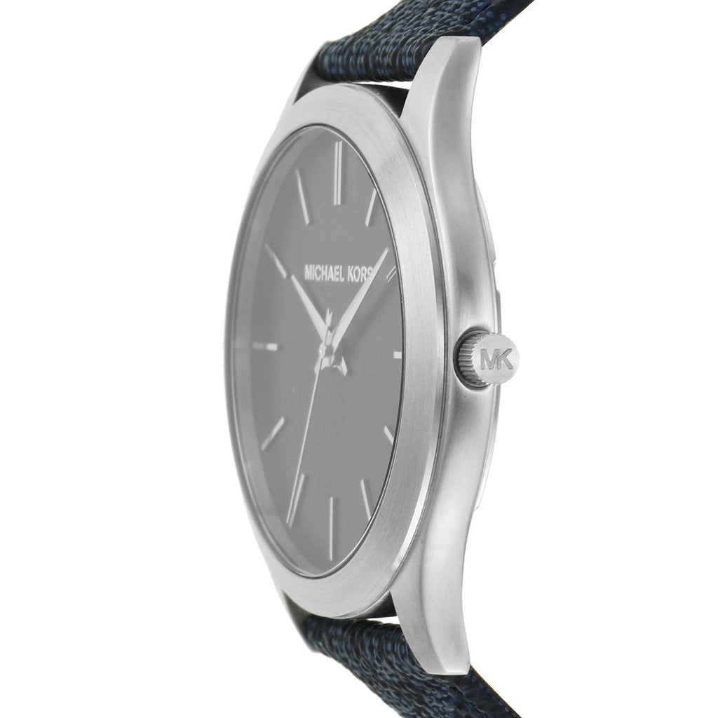 Michael Kors MK8907 side profile view showing silver case and navy textile strap
