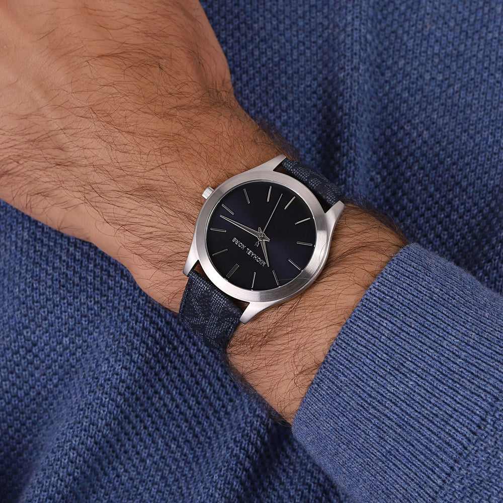 Michael Kors MK8907 Runway watch worn on wrist, showing navy dial and silver case