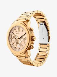 Michael Kors Lexington MK9249 side angle view showing gold-tone bracelet and case