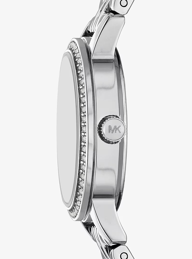 Side view of Michael Kors MKO1171 watch showing crystal-set bezel and case profile