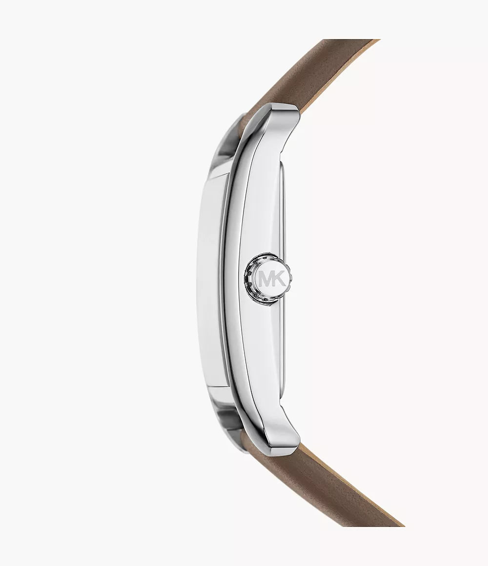 Side profile of Michael Kors Monroe watch showing silver case and brown leather strap