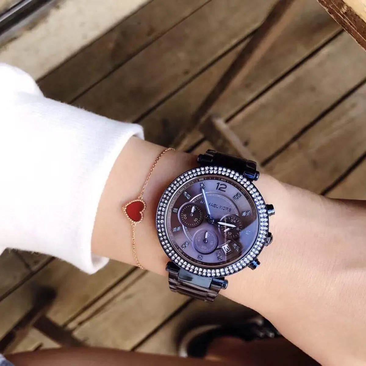 Michael Kors Parker MK6418 chronograph watch worn on wrist showing blue dial
