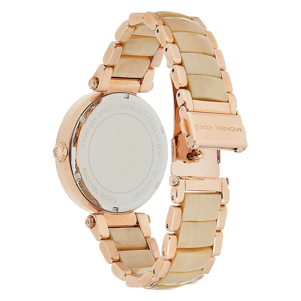 Case back view of Michael Kors Parker watch with rose gold metal and bracelet