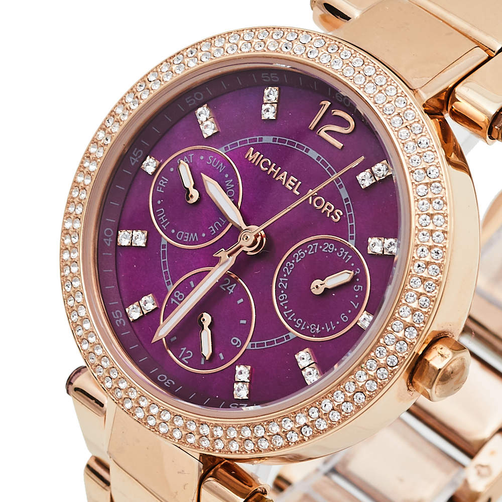 Close-up of plum purple dial with diamond hour markers and chronograph subdials