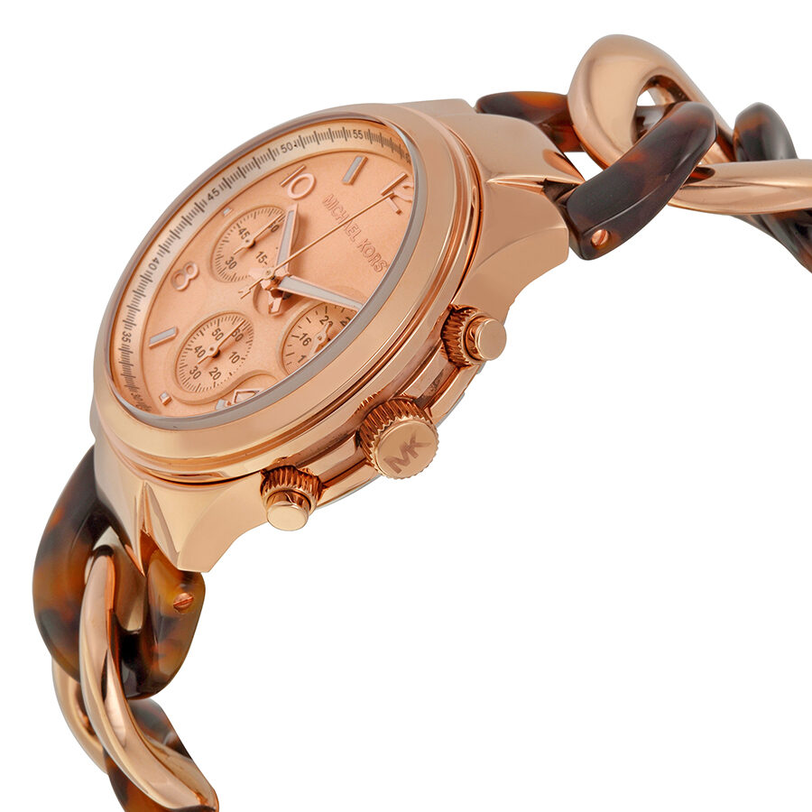 Michael Kors Runway watch angled view showing rose gold case and tortoise acetate strap detail
