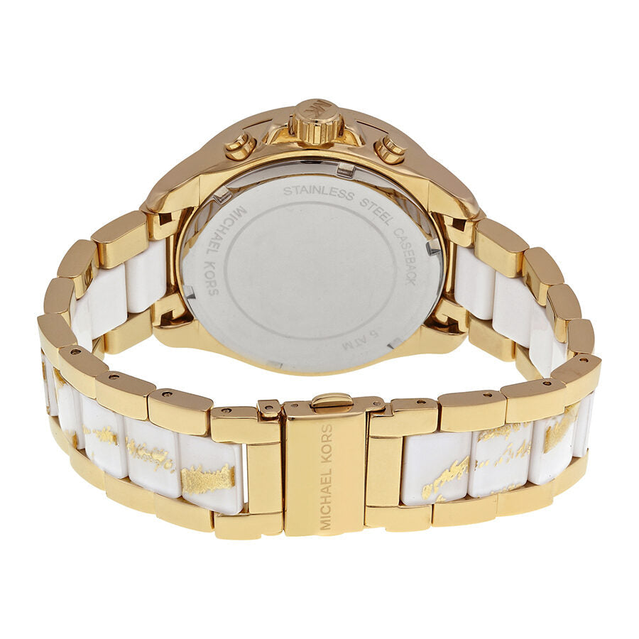 Michael Kors Wren watch caseback view showing stainless steel case and white gold-tone link bracelet