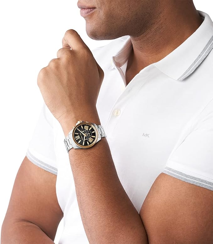 Michael Kors Wren watch worn on male wrist with white shirt