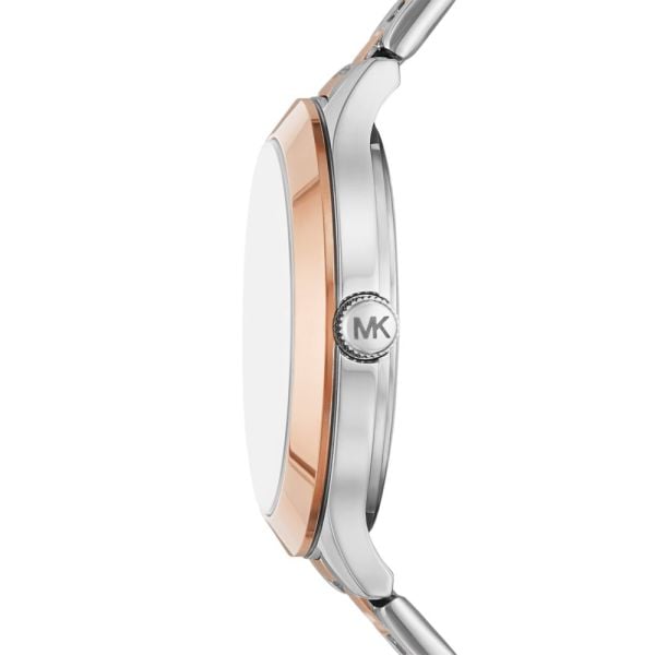 Side profile of Michael Kors MK1045 watch showing two-tone stainless steel case depth and design
