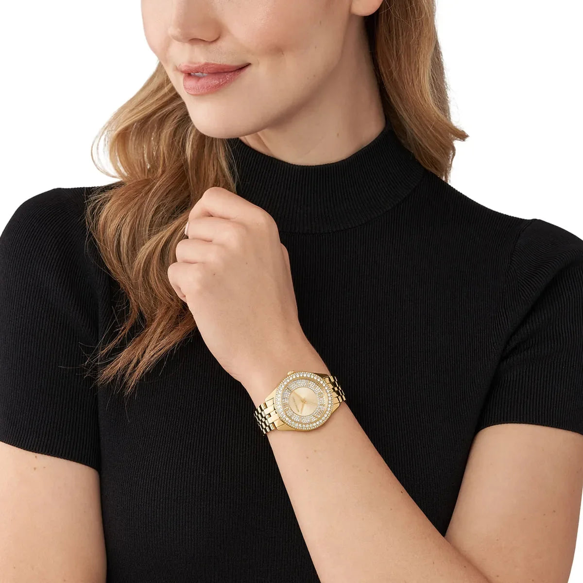 Michael Kors Harlowe gold-tone women's watch worn on wrist