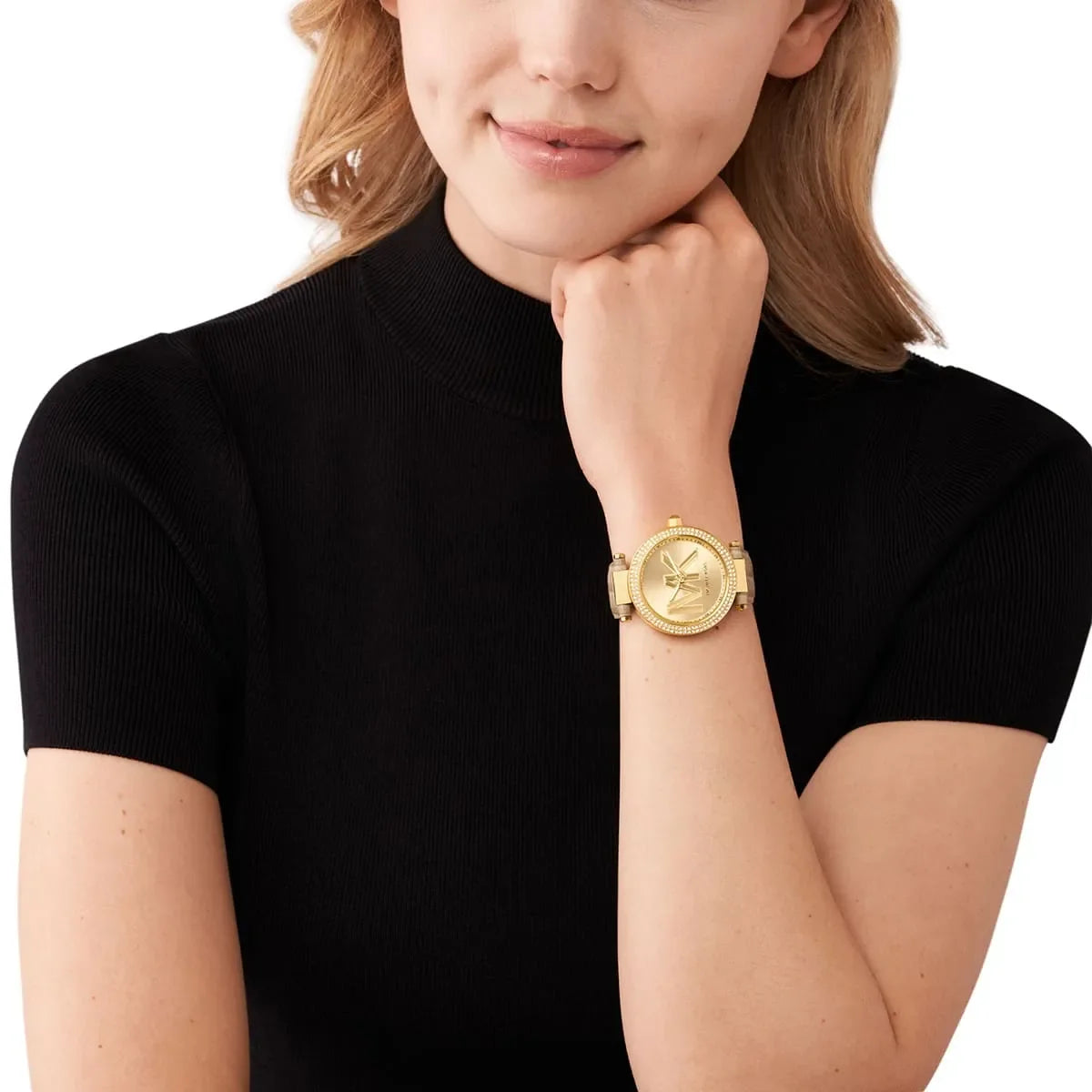 Michael Kors Parker MK4725 women's watch worn on wrist with gold-tone case and tan leather strap