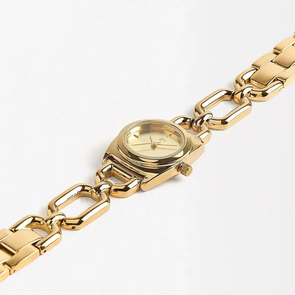 MK Astor Link watch displayed at angle showing case and gold bracelet