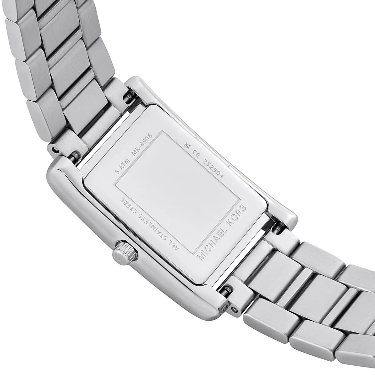 Michael Kors Essex caseback detail with engraved model information and branding