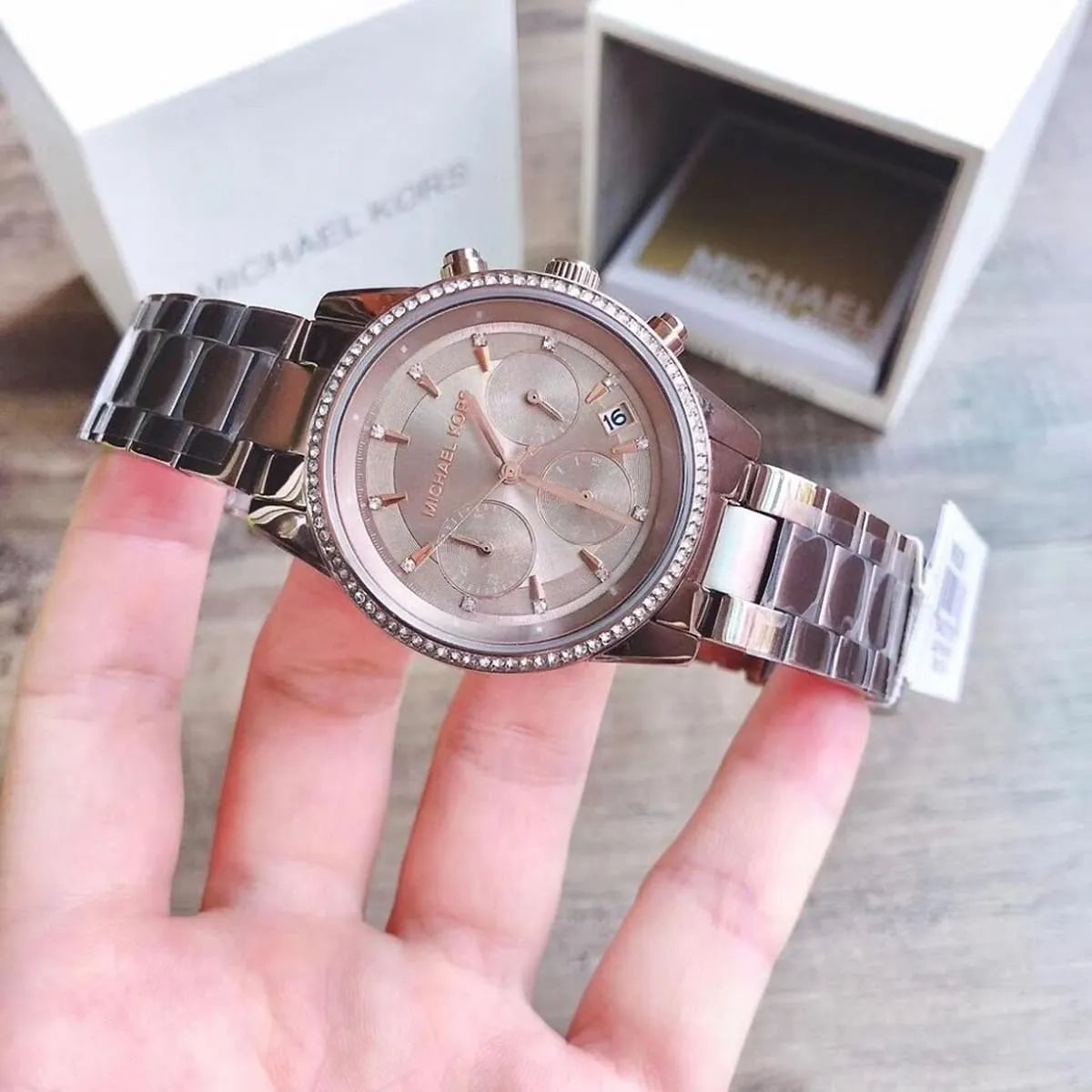 Michael Kors Ritz chronograph watch with packaging and retail box displayed
