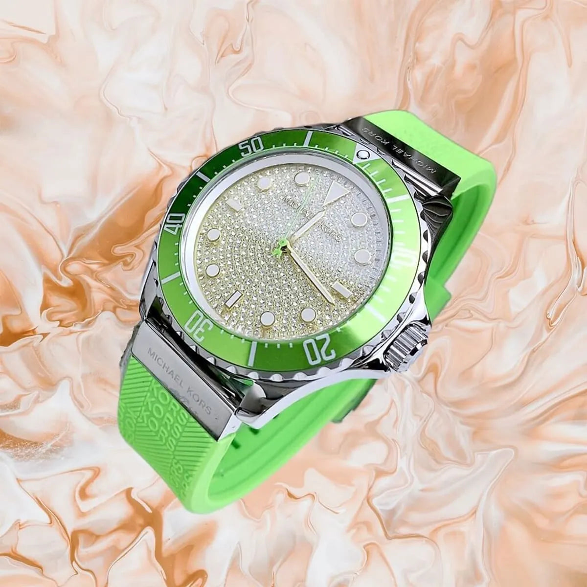 Michael Kors Everest MK7360 watch on wrist showing crystal-set dial and bright green bezel