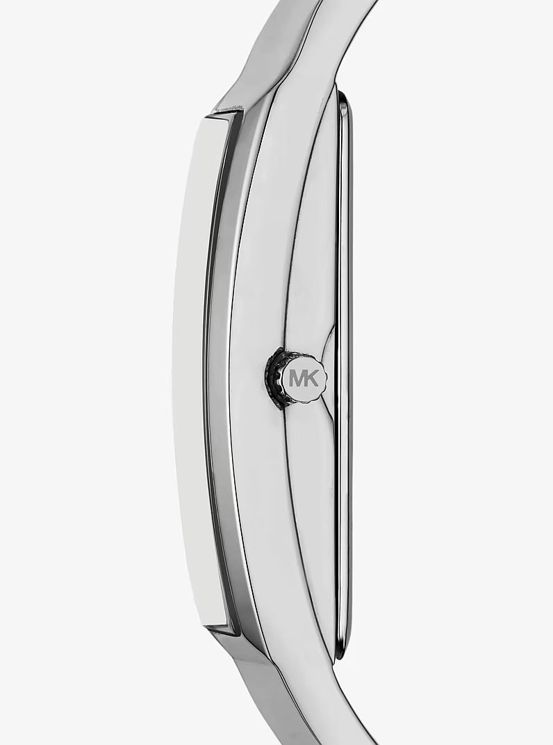 Side profile of Michael Kors bangle watch showing curved metal band and MK logo