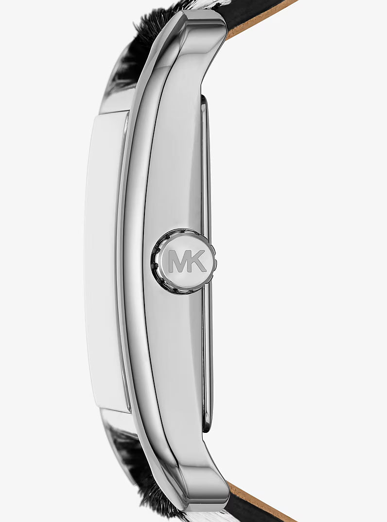 Side profile of Monroe watch showing silver-tone case thickness and zebra print strap detail