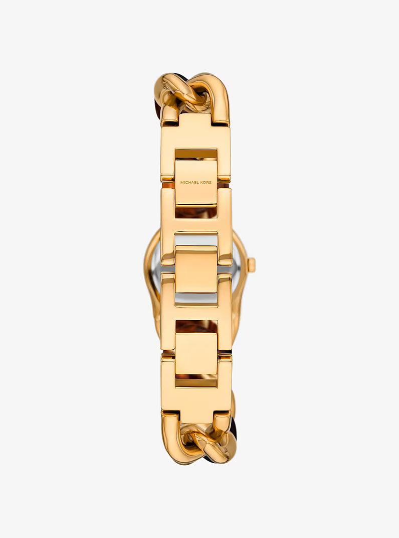 Petite Lock watch caseback showing gold-tone and tortoiseshell chain design