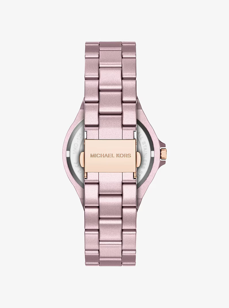 Case back of Michael Kors Mini Lennox watch showing gold-tone bracelet with clasp