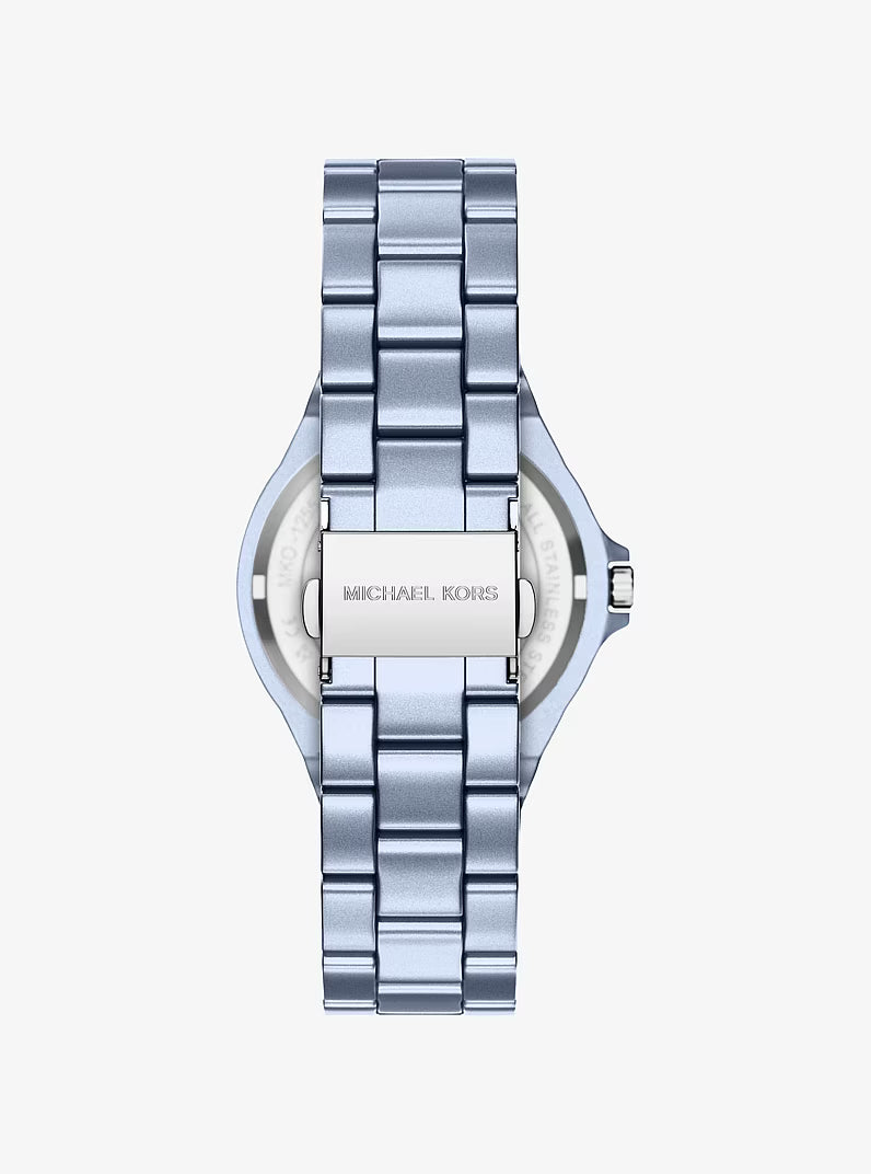 Michael Kors Mini Lennox caseback with brand engraving and blue-tone stainless steel strap