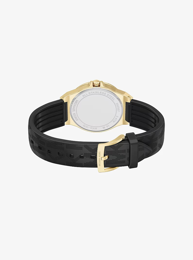 Michael Kors Lennox gold-tone watch worn on wrist with black textured strap