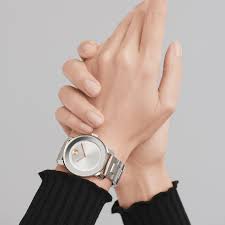 Movado Bold 36mm women's watch worn on wrist with silver dial